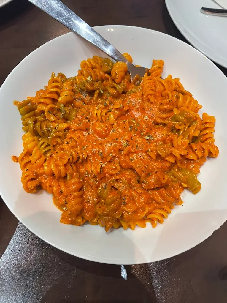 Fusion Veg Masala Pasta at Garlic and Greens in Edmonton